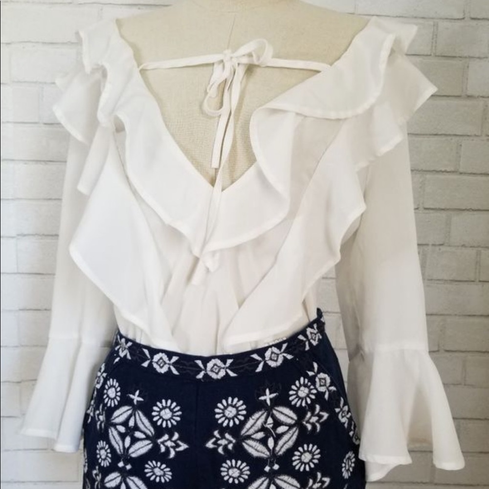 White flowy top